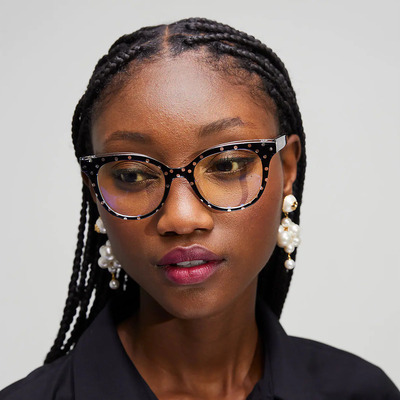 african american woman wearing black colored kate spade eyeglasses.jpg